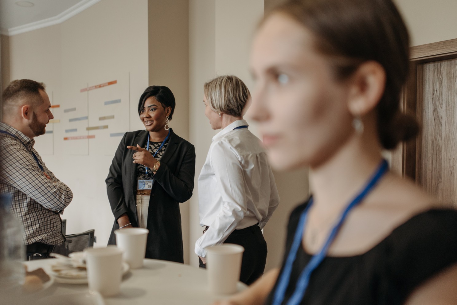 People having a discussion in an office.